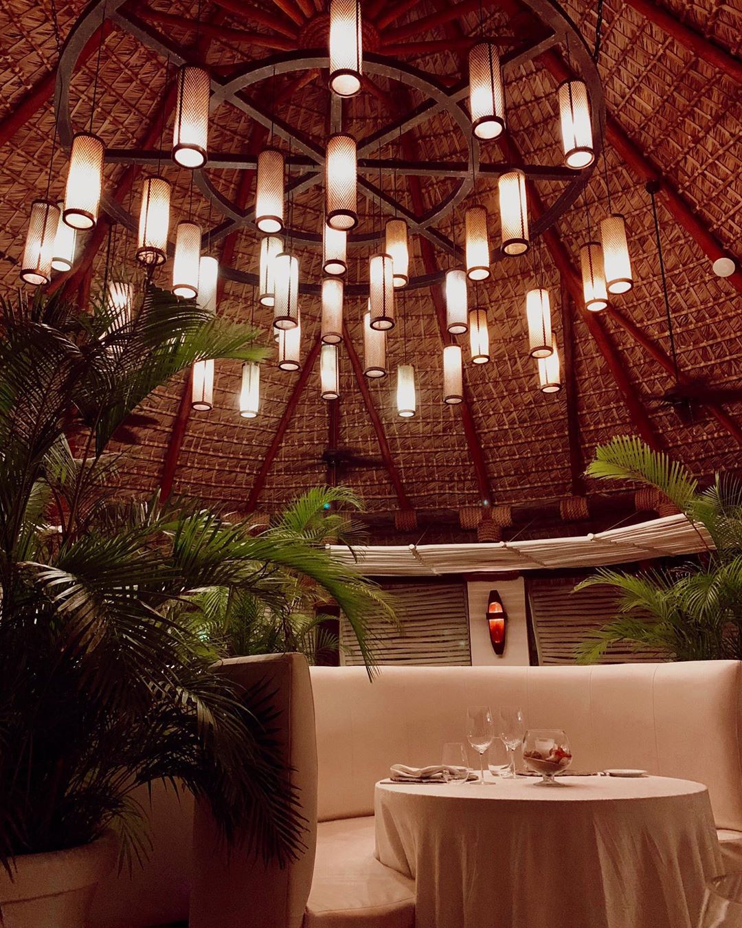 Zöetry Agua restaurant with lights above table.
